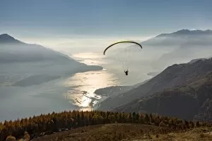 Images Dated 23rd February 2016: Paragliding over Lake Como and the surroundings mountains. Alto Lario, Como, Lombardy