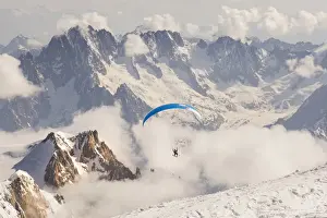 Alpinism Prints: Paragliding from the summit of Mount Balnc after rising it by ski mountaneering