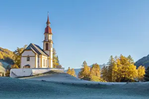 Tirol Prints: The parish church of Obernberg am Brenner on a cold autumn morning