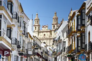 The Parish of Our Lady of the Incarnation framed by typical architecture, Olvera