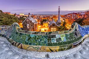 Images Dated 4th February 2021: Park Guell and city skyline at dusk, Barcelona, Catalonia, Spain