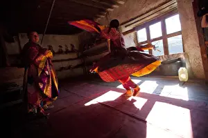 Participants at the tsechu in Wangdue Phodrang getting ready for a performance