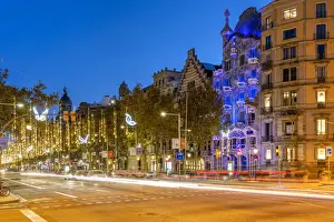 Christmas Lights Prints: Passeig de Gracia avenue adorned with Christmas lights and Casa Battlo, Barcelona