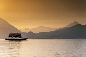 Passenger Ferry Prints: Passenger ferry on Lake Como at sunset, Varenna, Lombardy, Italy