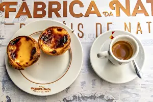 Speciality Prints: Pastel de belem or pasteis de nata custard tarts served with a cup of coffee in a