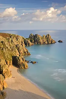 Logan Rock Prints: Pednvounder Beach backed by Logan Rock on Treryn Dinas headland, Porthcurno, Cornwall