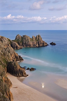 Pednvounder Beach and Logan Rock from the clifftops near Treen, Porthcurno, Cornwall, England Pednvounder Beach and Logan Rock from the clifftops near Treen, Porthcurno, Cornwall, England