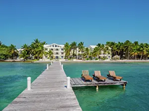 Deckchair Prints: Pelican Reef Villas Resort at the waterfront of San Pedro Town
