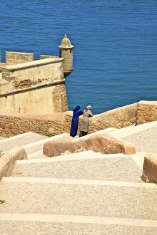 Images Dated 28th May 2015: Two People On City Walls, Oudaia Kasbah, Rabat, Morocco, North Africa