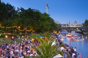 People dancing by the Spree River, Berlin, Germany