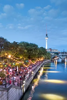 People dancing by the Spree River and Bode Museum, Berlin, Germany