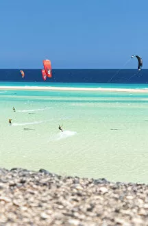 Wind Gallery: People having fun with kiteboard in the rough sea, Sotavento beach, Jandia, Fuerteventura