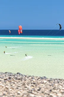 Wind Prints: People having fun with kiteboard in the rough sea, Sotavento beach, Jandia, Fuerteventura