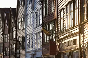 People sat at pavement bars / cafes, Bryggen, the medieval quarter of Bergen, Hordaland