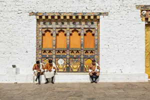 Bhutan Prints: People sitting at the Punakha Tshechu (otherwise known as Punakha Festival)