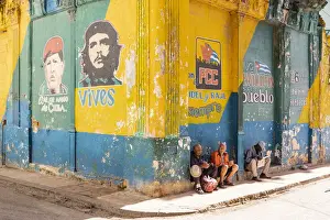 Street Art Prints: People sitting on a street corner in La Habana Vieja (Old Town), Havana, Cuba
