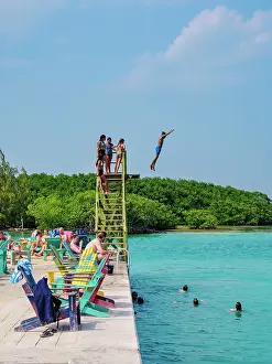 Jumping Prints: People swimming at The Lazy Lizard Bar and Grill