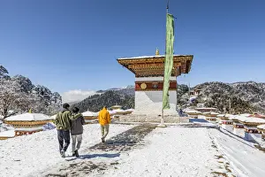 Stupas Prints: People walking amongst the 108 memorial chortens or stupas at Dochula Pass, Bhutan