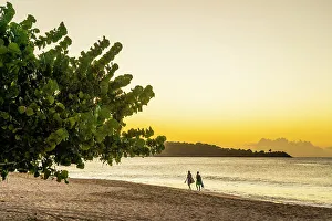Two People Prints: Two people walking at sunset, Grand Anse Beach, Grenada, Caribbean