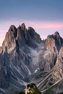 One person admires the Cadini di Misurina mountain range, Auronzo di Cadore, Belluno
