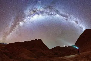 Night Sky Prints: Person pointing the Milky Way with head torch