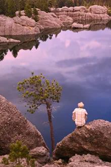 Images Dated 29th May 2013: Person standing on rocks, Sylvan Lake, Custer State Park, Black Hills, Custer County