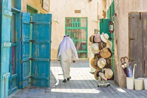 Al Seef Prints: Person walking in Al Seef, Dubai Creek, Dubai, United Arab Emirates