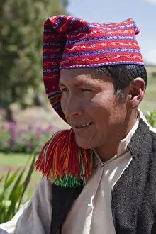 Peru Prints: Peru, A Quechua-speaking man on Taquile Island wearing traditional dress