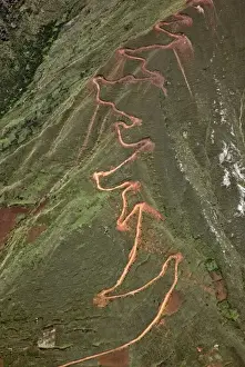 Sacred Valley Prints: Peru. A trail zigzags up a steep ridge on the Andean Mountains east of Cusco