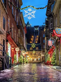 City Walls Prints: Petit Champlain, Rue Sous Le Fort with rain and colorful Light Reflections