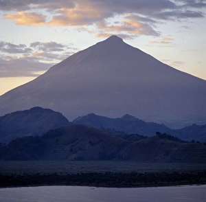Ridges Prints: Photographed from Lake Mutanda at sunrise, Mount Muhavura looms like a huge pyramid