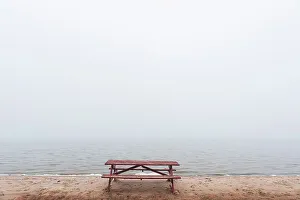 Bench Prints: Picnic table on beach in fog St. Joseph's Island, Ontario, Canada