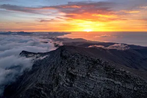 Concepts Prints: Pico de la Zarza peak emerging from clouds, Jandia, Fuerteventura, Canary Islands, Spain
