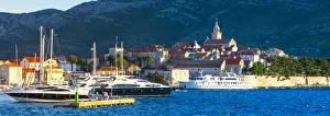 The picturesque coastal village of Korcula illuminated at sunrise, Korcula Town, Korcula
