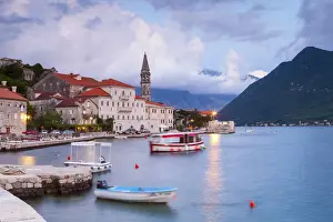 The picturesque coastal village of Perast illuminated at dusk, Perast, Bay of Kotorska