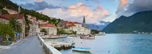 The picturesque coastal village of Perast illuminated at sunset, Perast, Bay of Kotorska