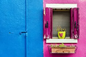 Picturesque colourful detail of a painted house in Burano, Veneto, Italy