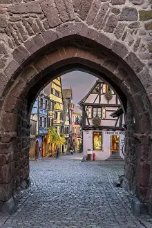 Grand Est Prints: Picturesque street with traditional half-timbered houses