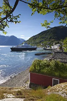 The picturesque village of Utne nestled into a little bay in the idyllic Hardangerfjord