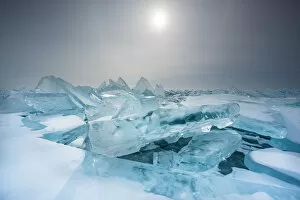 Pieces of ice with sun reflection at lake Baikal, Irkutsk region, Siberia, Russia
