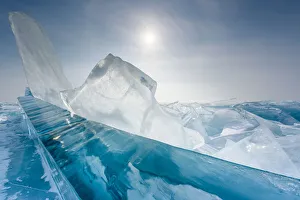 Transparent Prints: Pieces of transparent ice with sun reflection at lake Baikal, Irkutsk region, Siberia