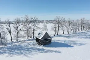 Daylight Prints: The pile house in the house pond in winter