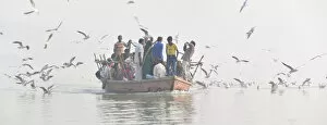 Pilgrimage Gallery: Pilgrims on the Ganges river, Varanasi, India