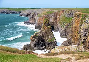 Cliff Top Prints: Pinnacle Stack, a distinctive sea stack in Mowingword Bay, Pembrokeshire, Wales
