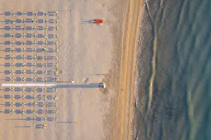 Gargano Prints: Pizzomunno beach and its umbrellas. Foggia province, Gargano National Park, Apulia, Italy