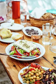 Produce Prints: Plate of Greek Salad at Kiki's Tavern restaurant table, Mykonos, Greece, Europe