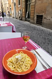Plate of traditional tonnarelli cacio e pepe served in a restaurant in Rome, Lazio, Italy