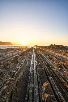 Basque Prints: Playa Itzurun, Zumaia, Gipuzkoa, Basque Country, Spain. Flysch formation at sunset