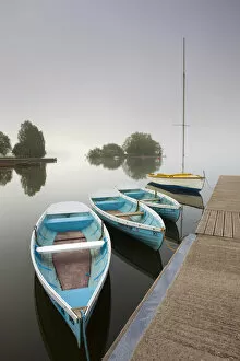 Images Dated 8th November 2016: Pleasure boats moored at Llangorse Lake on a misty morning, Brecon Beacons National Park