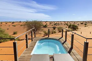 Kalahari Prints: A plung pool looks out to the desert, Bagatelle Kalahari Game Ranch, Namibia, Africa